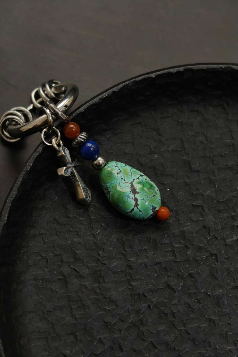 dettaglio-cerchio-liscio-titanio-otto-piccoli-anelli-mobili